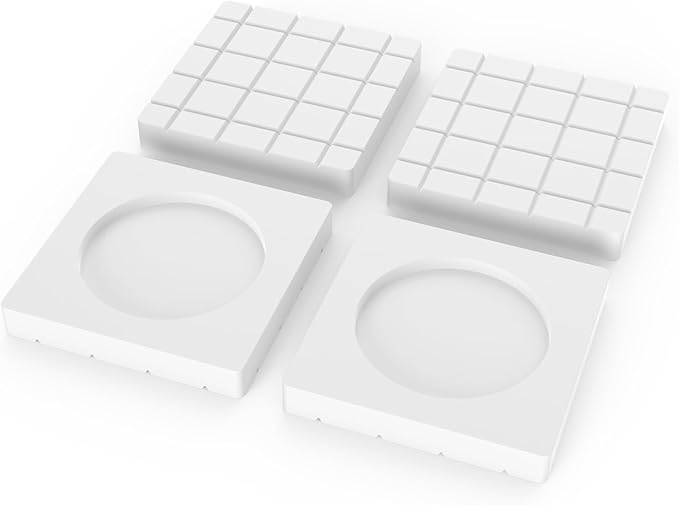 Four white square anti vibration pads display picture on a white background