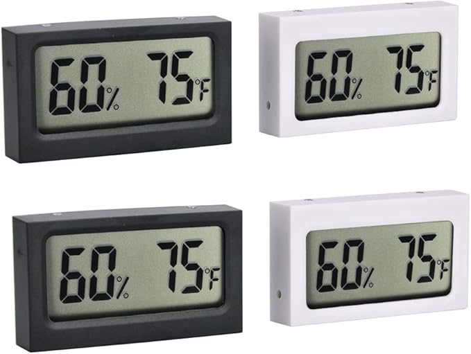 Four digital thermometers and hygrometers in black and white on a white background.