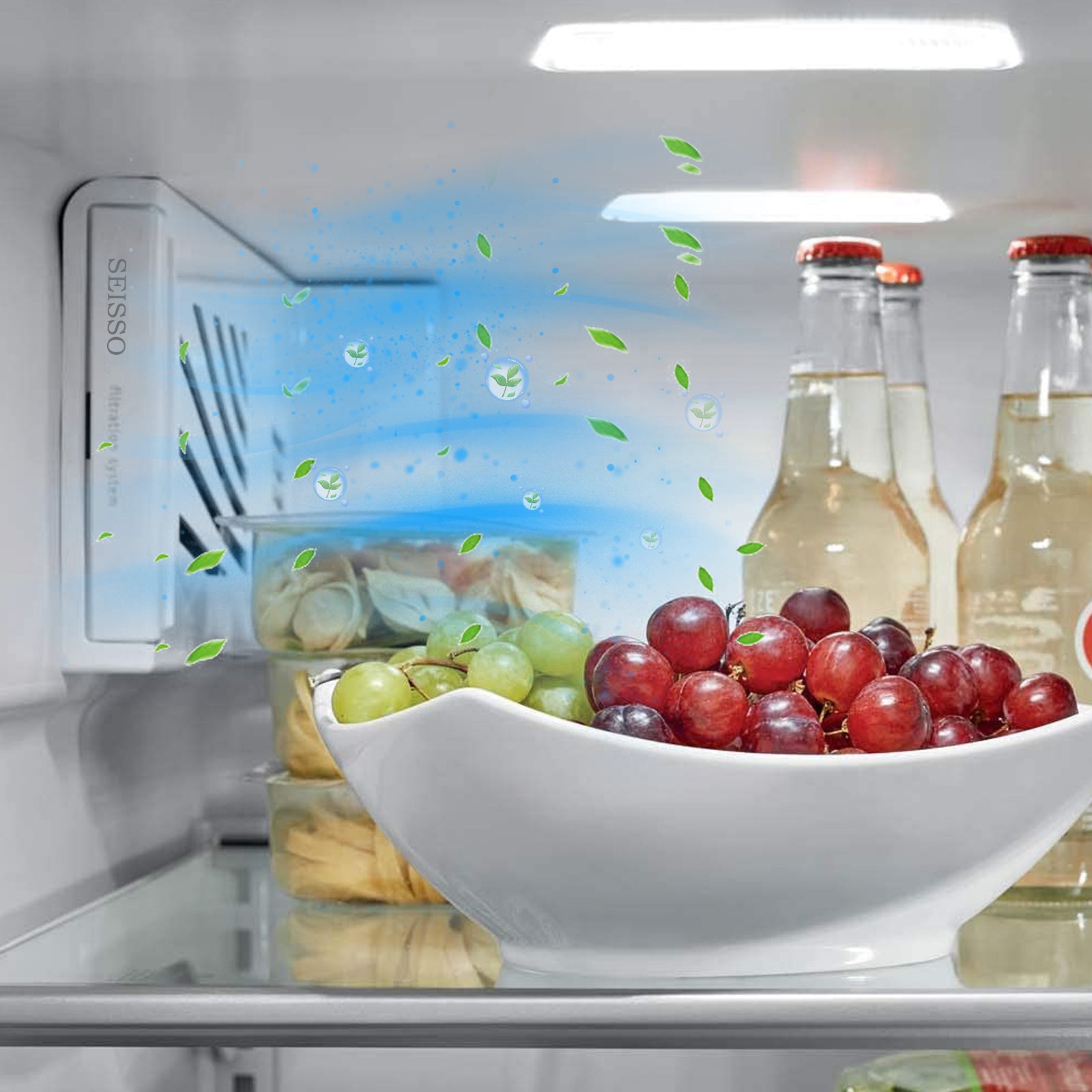 Fridge interior with a bowl of grapes, bottles with Seisso fridge air filter.